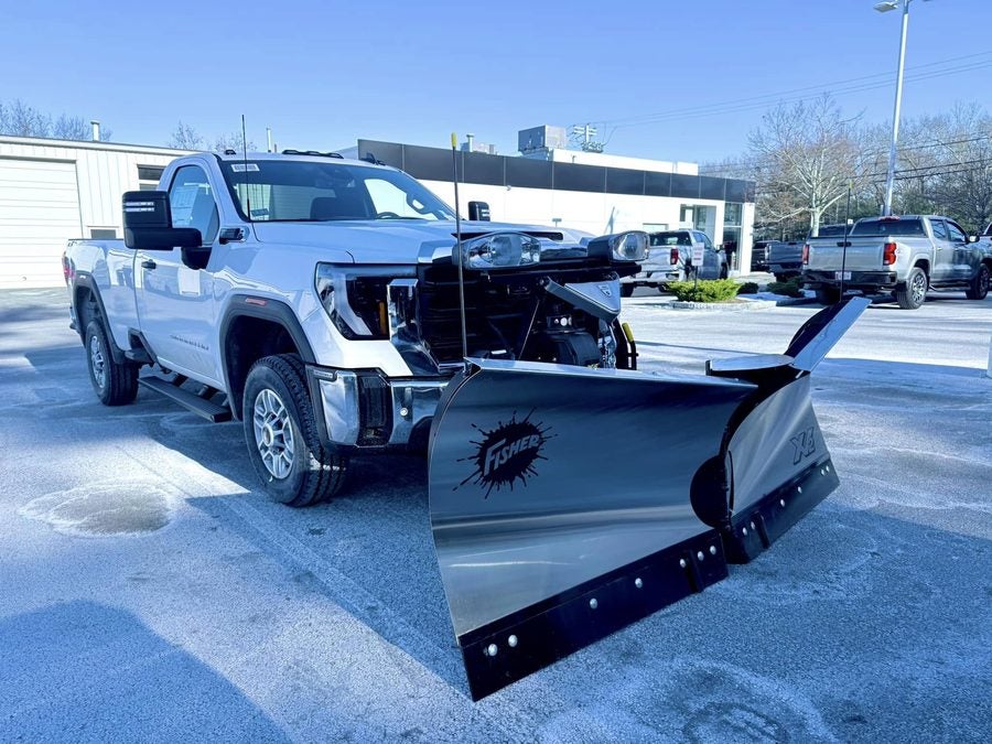 Fisher XV2 stainless v-plow installed on a white GMC Sierra 2500HD at Marty's GMC in Kingston, MA